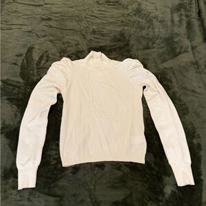 Express off white sweater with ruffled shoulder detail